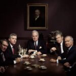 7 businessmen at a table; table of board of directors; board of directors; business people at table